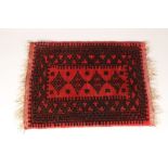 Afghan salon nomadic tribal rug, circa 1910, red ground, geometric pattern, length 85cm, width 65cm