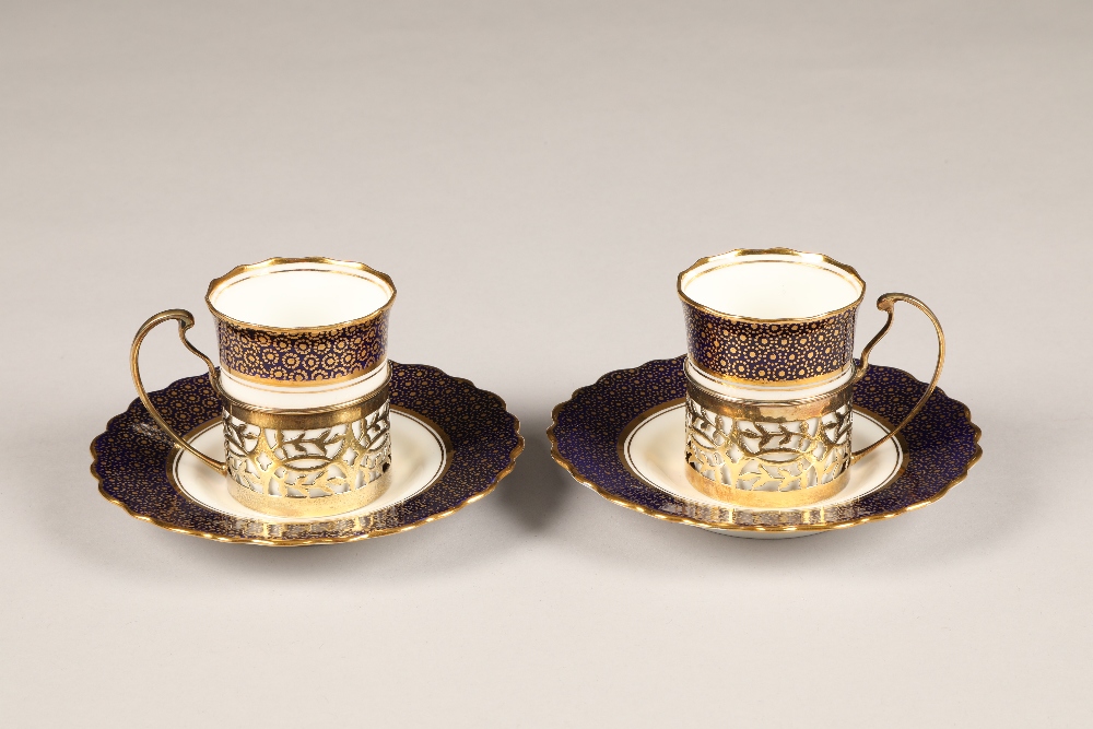 Boxed Aynsley bone China coffee set, consisting of six saucers and six coffee cups with pierced