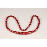 Cherry amber bead necklace, length 75cm, largest bead 21mm, total weight 70g