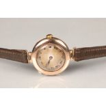 Early ladies 9 carat gold Rolex wristwatch, plain dial with black hands and Roman numerals, 15