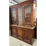 Victorian mahogany bookcase, moulded cornice over three plain glazed doors over three cupboard doors
