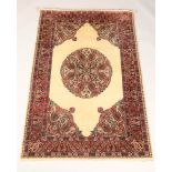 Persian rug, cream ground with a central circular medallion in green blue and red, length 179cm,