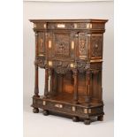 19th century north European walnut cabinet, decorated with finely carved neoclassical figure