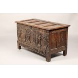 Oak carved coffer chest, with fitted drawer, oak four panel lid, over three carved arches to the