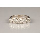 Ladies five stone diamond ring, on an eighteen carat yellow gold shank, three central 0.5 carat