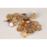 Heavy 9 carat gold double curb link charm bracelet, with fifteen assorted charms, including three