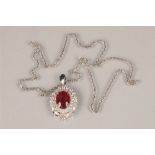 Ladies eighteen carat white gold ruby and diamond pendant, a combination of round brilliant cut