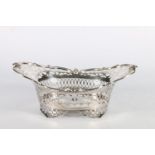 Sterling silver pierced basket with cherub but mounts, James Fenton and Co, Birmingham, 1901, 191g.