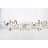 Sterling silver four piece tea service on stepped base, Brook and Son, Sheffield, 1932, 1862g.