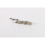 Attractive white metal diamond set bow brooch, 4 grams.