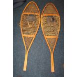 Pair of Canadian snowshoes by Faber, 115cm long.