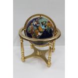 Reproduction gem set globe on brass frame, 37cm tall.