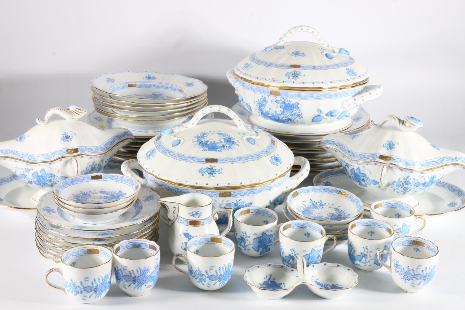 Herend of Hungary porcelain dinner and coffee service with floral and gilt pattern comprising