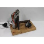 Mining interest, a mining themed tabletop lamp display with miner's battery, head torch and pick