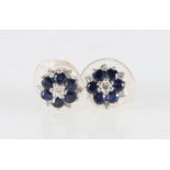 Pair of 18ct white gold diamond and sapphire stud earrings, KF and S, London, 1976, 3.9g