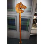 Wooden hobby horse, 160cm long.