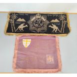 Two WW2 embroidered banners the first on black velvet belonging to the Royal Army Service Corps with