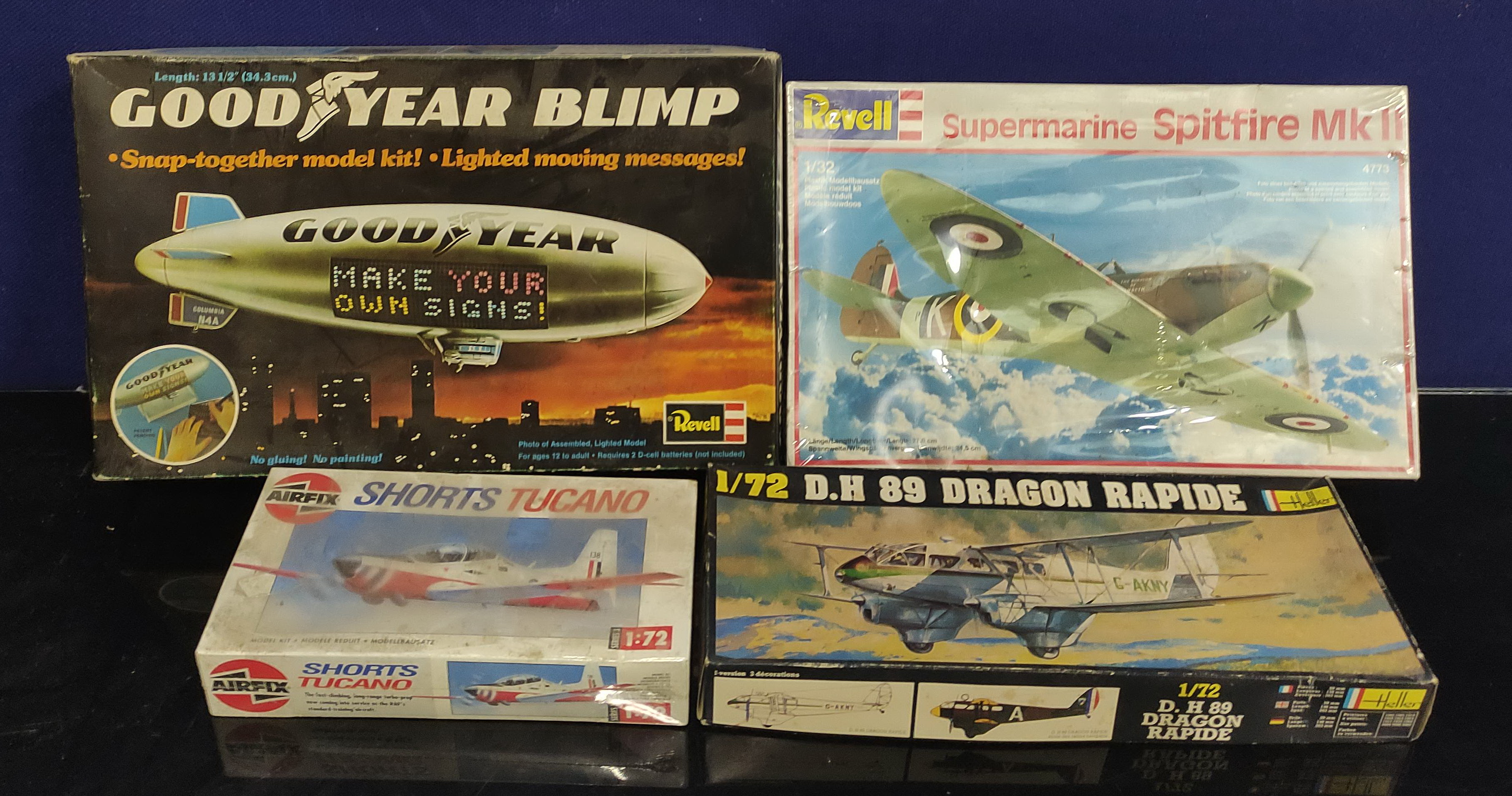 Group of boxed model vehicles including Revell Goodyear Blimp, Revell; Supermarine Spitfire MKII,