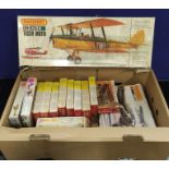 Box of Matchbox and Revell model kit vehicles including a DH-82A/C Tiger Moth, He 111 H, Hurricane