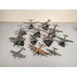 Twelve collector's model airplanes. To include a Hawker Hurricane MKI, Heinkel He.177, Short