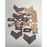 Collection of WW2 patches and buttons including Wireless Operator patch, Air Gunners, Sergeant