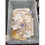 Box containing a large quantity of loose World postage stamps.