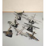 Seven collector's model airplanes. To include a Supermarine Spitfire MKI, B-29 Superfortress, B-24