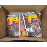 Box of DC Batgirl and Wonder Woman comics.