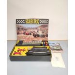 Vintage 1960s Tri-ang Scalextrics Set 32. Boxed with booklet, controllers, track, cars and scenery.