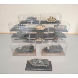 Sixteen Military Model vehicles in clear perspex cases. Comprising of a T34 Tank, M4 Sherman (D-