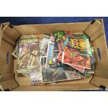 Box of Dark Horse Predator comics.