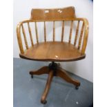 Edwardian oak revolving office chair.