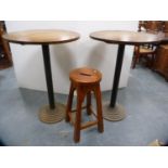 Pair of tall pub tables on metal bases and a bar stool.  (3)