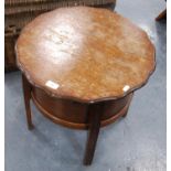 Vintage oak circular sewing table and contents.