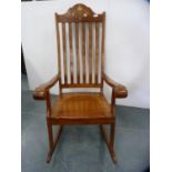 Similar brass inlaid rocking chair.