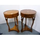 Pair of circular two-tier lamp tables, each fitted with a single drawer.