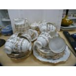 Wedgwood 'Lichfield' pattern part tea for two set and a Royal Stafford part tea set.