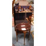 Walnut mirrored demi-lune hall table.