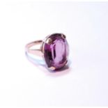 9ct gold amethyst lady's ring set with a large amethyst stone in a claw setting, 6.9g gross, size Q.