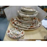 Victorian set of graduated ashets, tureen and stand and plates.  (11)