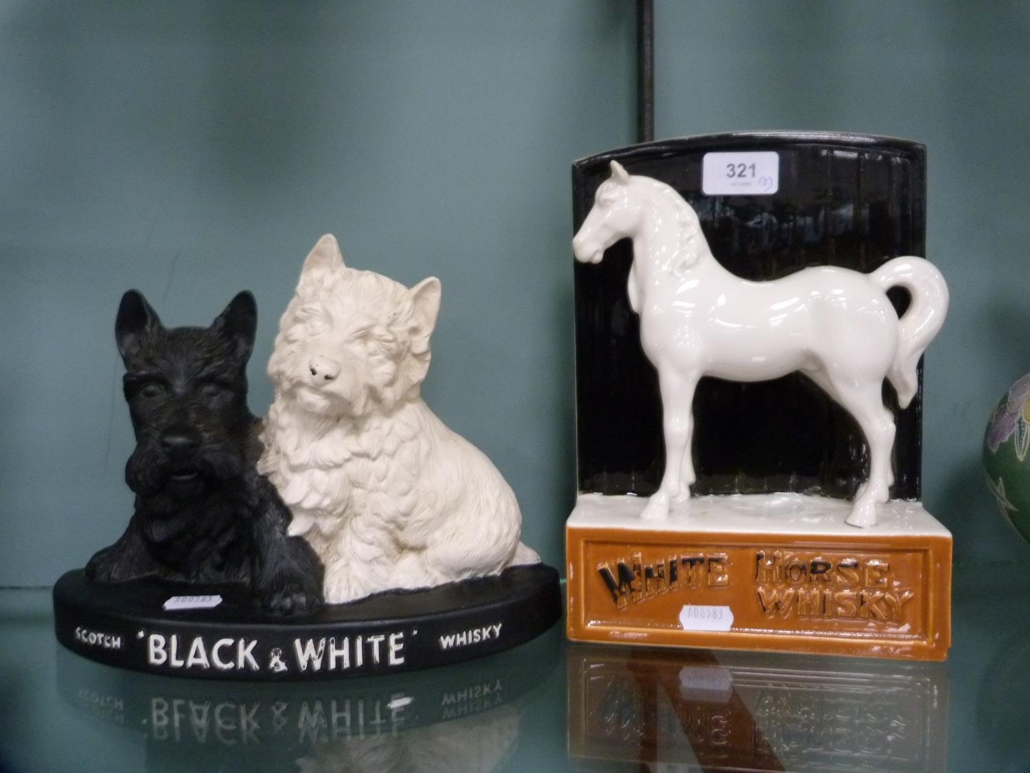 White Horse Whisky ceramic advertising figure/bookend, no. 9473, with a Scottie Dog Black & White