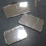 Three vintage unframed wall mirrors.