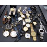 Tub of assorted gent's fashion watches to include quartz examples, also pocket watches to include