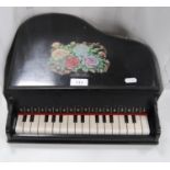 Chinese ebonised toy piano.