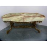 Ornate onyx-style topped occasional table.
