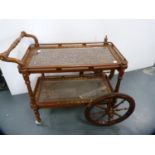 Middle eastern brass inlaid supper wagon.