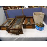 Box containing Victorian and later clock parts, dials, weights, movements, pendulum parts etc.,