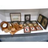 Regency-style portrait silhouettes, pair of Art Deco-style wooden bookends, modern mantel clock,