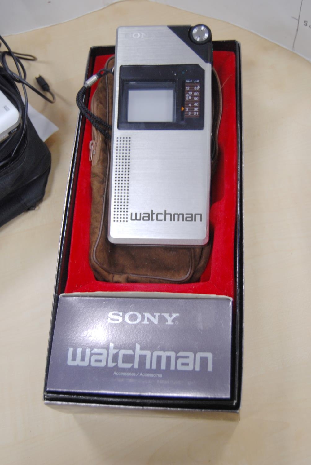 Bush portable DVD player with carry bag and accessories, and a boxed Sony Watchman with pouch. - Image 2 of 7