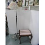 Painted metal adjustable floor lamp with shade and a mahogany dressing stool frame.